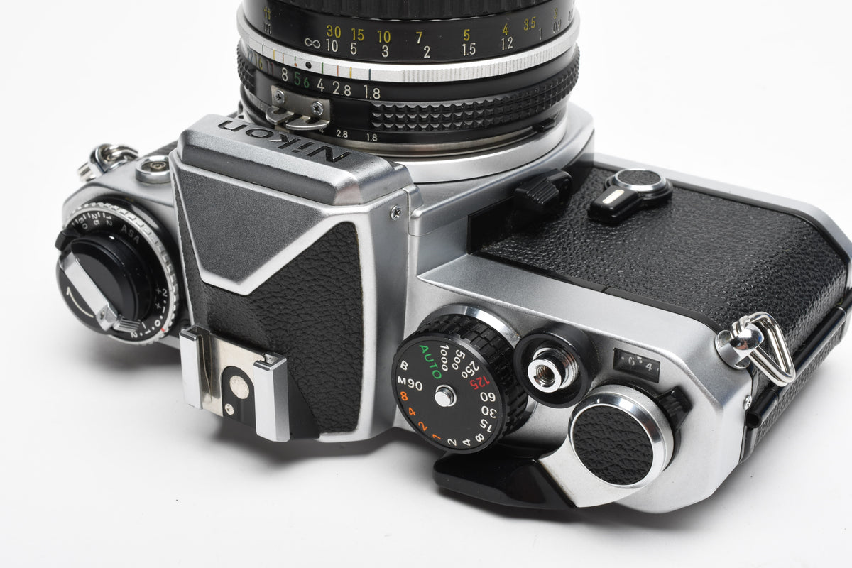 Nikon FE 35mm SLR w/Nikkor 50mm f1.8 Lens, Strap, New Seals, Great!