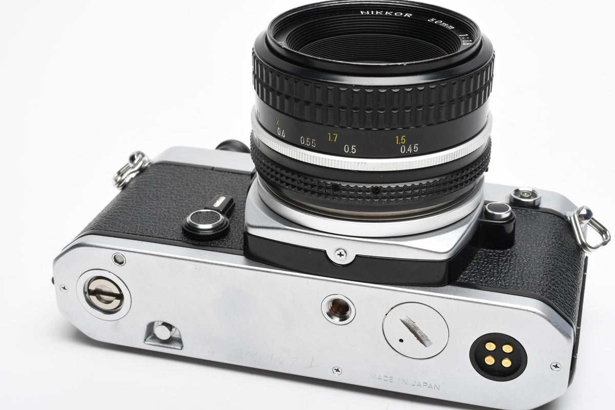 Nikon FE 35mm SLR w/Nikkor 50mm f1.8 Lens, Strap, New Seals, Great!