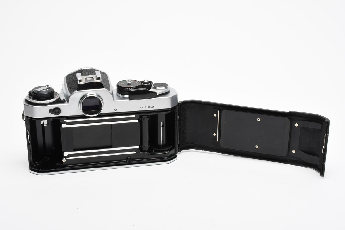 Nikon FE 35mm SLR w/Nikkor 50mm f1.8 Lens, Strap, New Seals, Great!