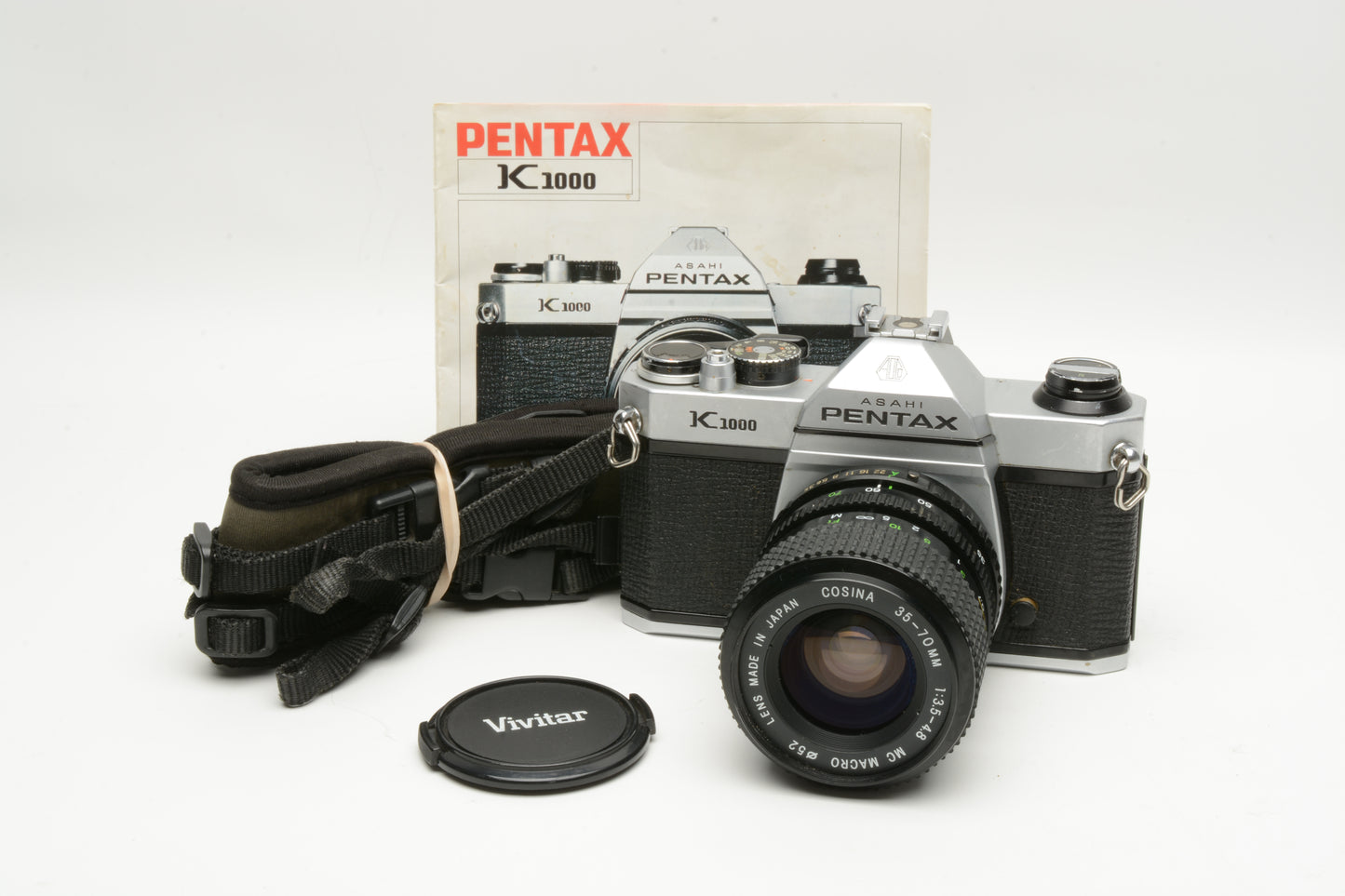 Pentax K1000 35mm SLR w/35-70mm zoom lens, New seals, strap, Great!