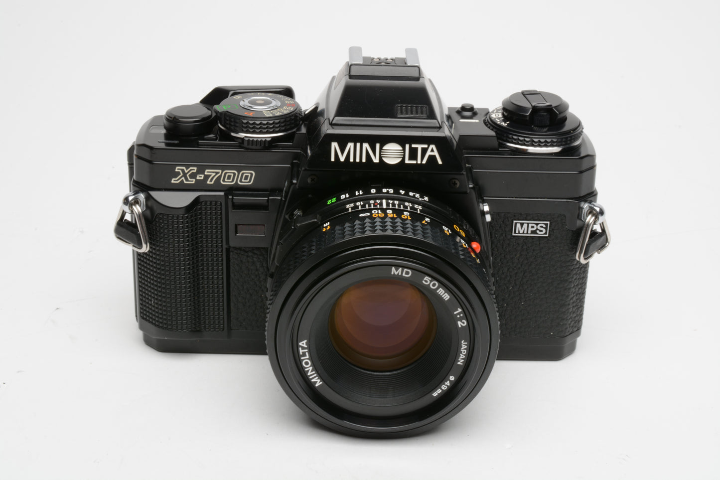 Minolta X700 35mm SLR w/50mm f2 lens, strap, cap, Sky, good seals, Great!