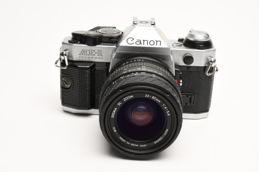 Canon AE-1 Program 35mm SLR Camera w/Sigma 35-80mm Zoom, New Seals