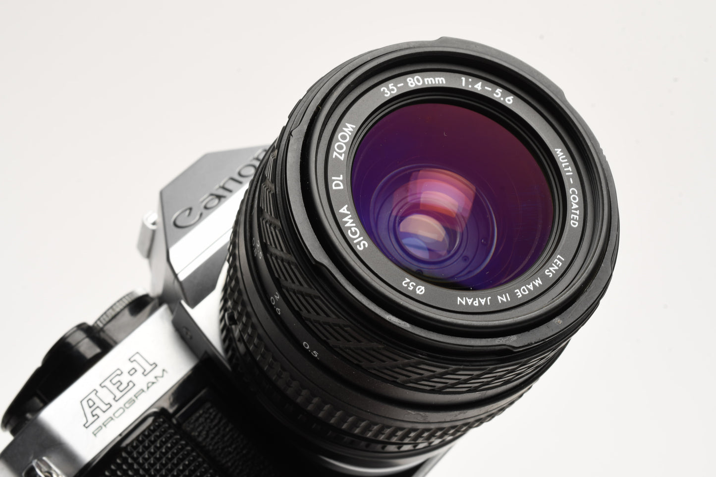 Canon AE-1 Program 35mm SLR Camera w/Sigma 35-80mm Zoom, New Seals