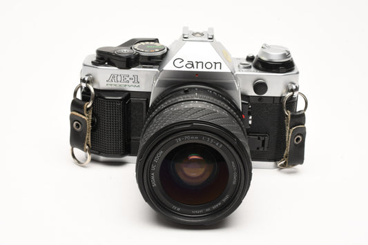 Canon AE-1 Program 35mm SLR Camera w/Sigma 28-70mm Zoom, New Seals