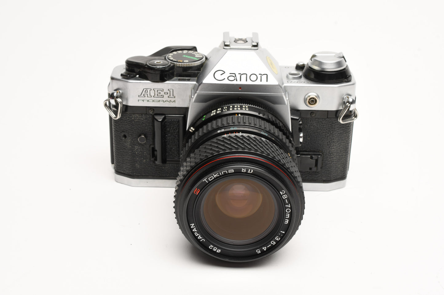 Canon AE-1 Program 35mm SLR Camera w/Tokina 28-70mm Zoom, New Seals