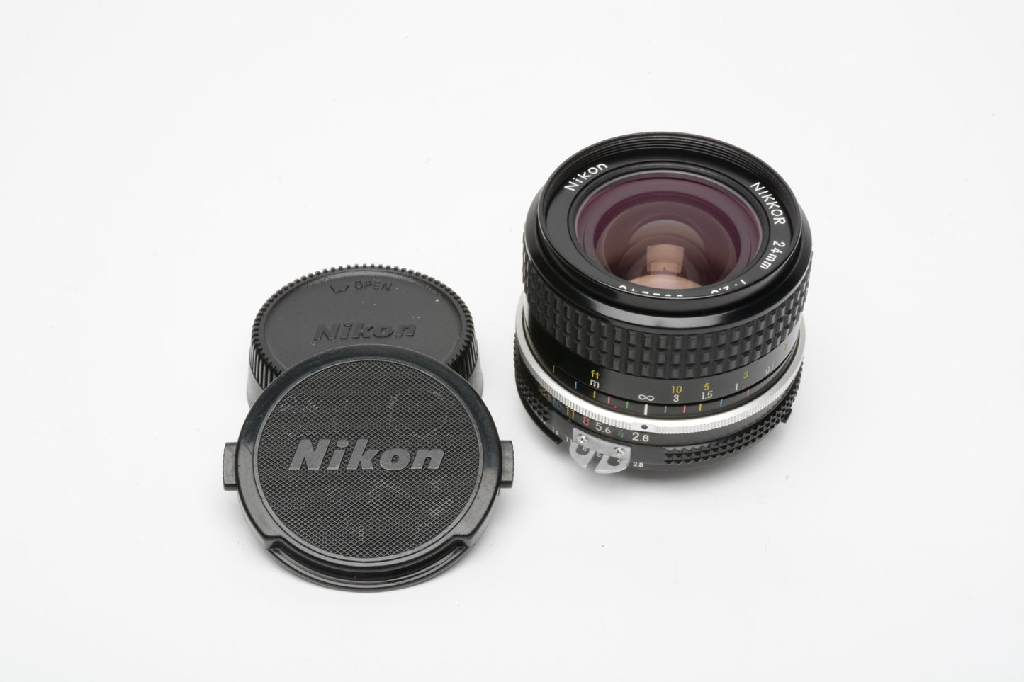 Nikon Nikkor Ai 24mm f2.8 Wide Angle prime lens, Caps