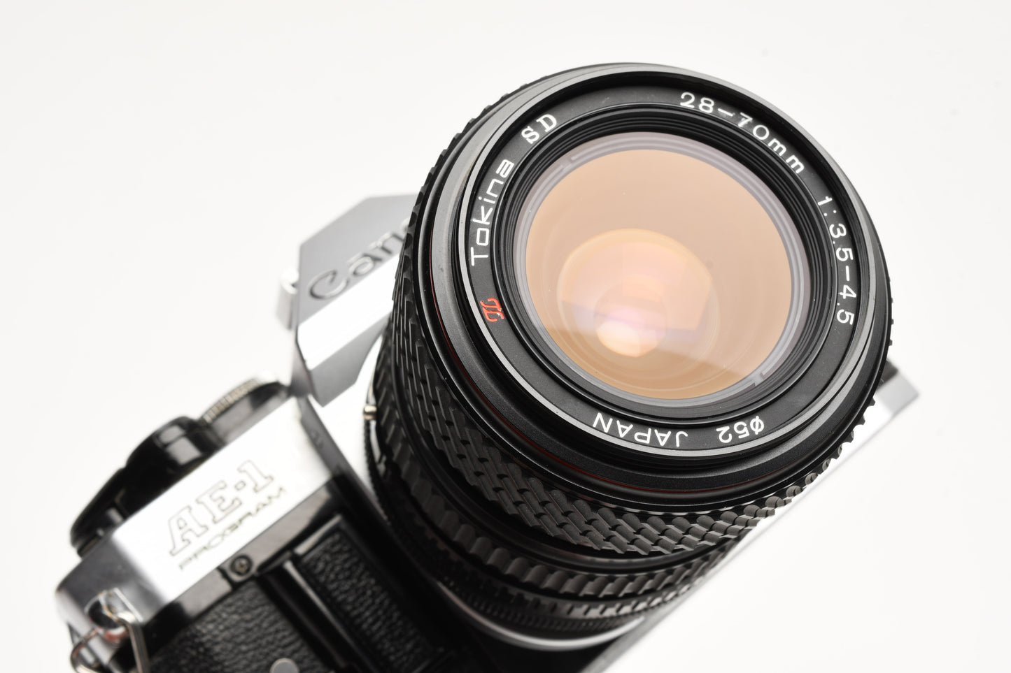 Canon AE-1 Program 35mm SLR Camera w/Tokina 28-70mm Zoom, New Seals