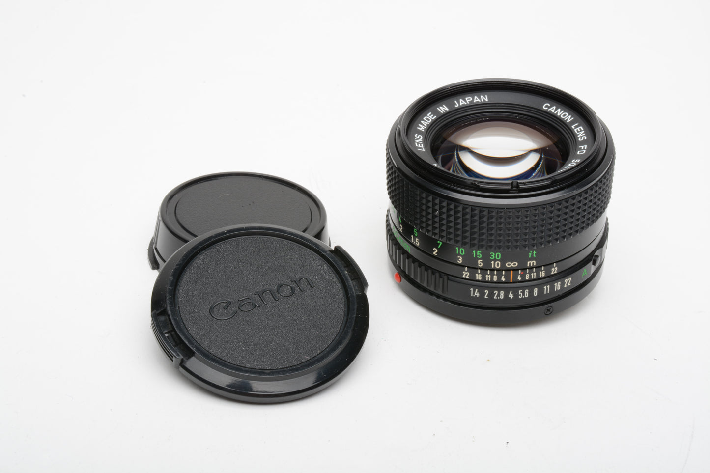 Canon 50mm f1.4 N FD mount lens, very clean and sharp, caps