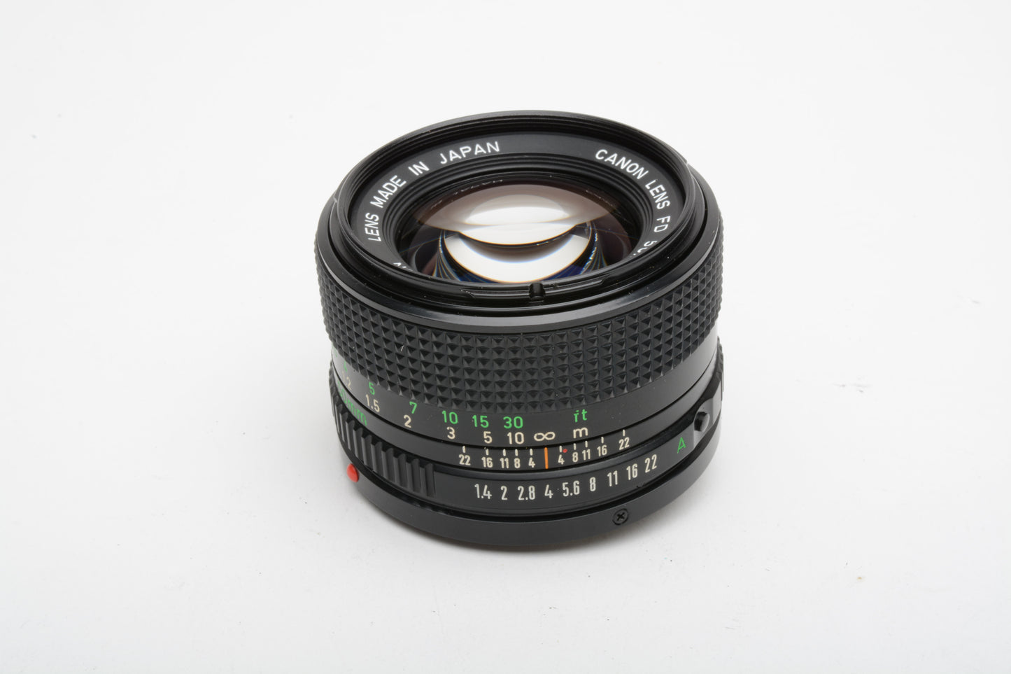 Canon 50mm f1.4 N FD mount lens, very clean and sharp, caps