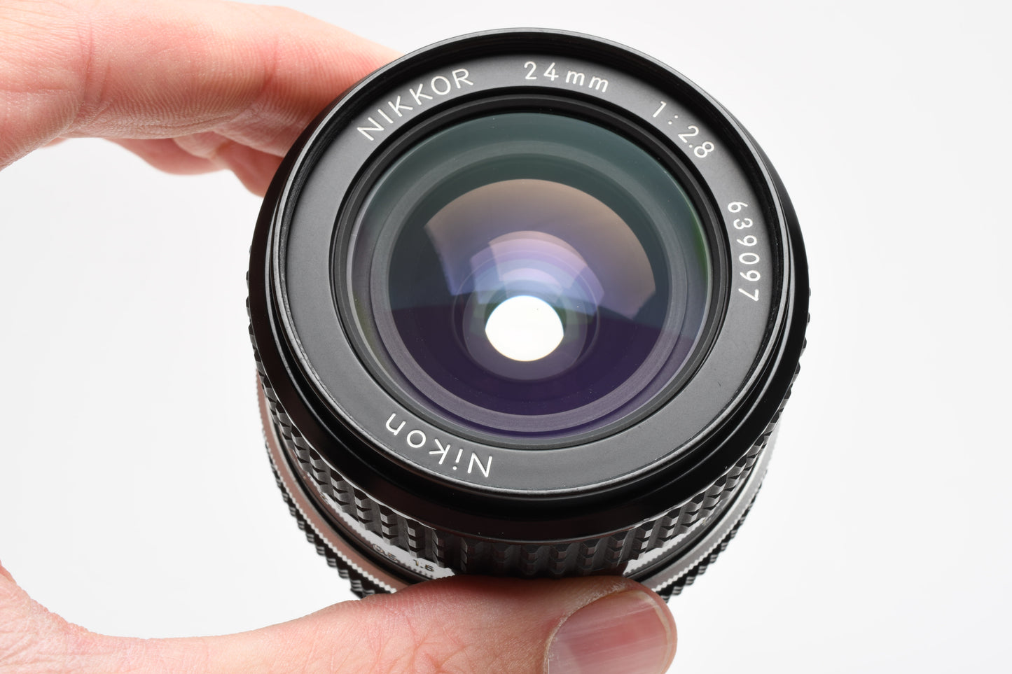 Nikon Nikkor 24mm f2.8 AI lens w/L1Bc Skylight filter, Great! Sharp