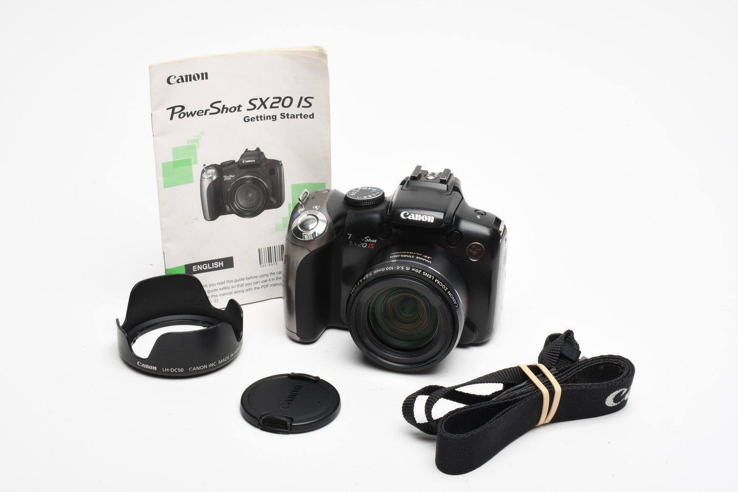 Canon Powershot SX20IS 12.1MP Digital Point&Shoot camera, hood, strap, manual