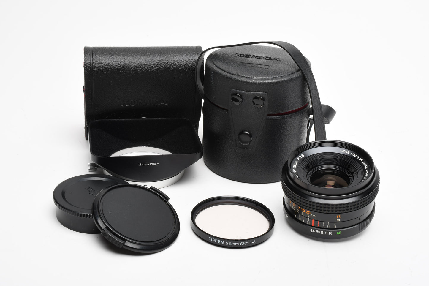 Konica Hexar 28mm f3.5 wide angle lens w/Skylight, Hood, Caps, Cases