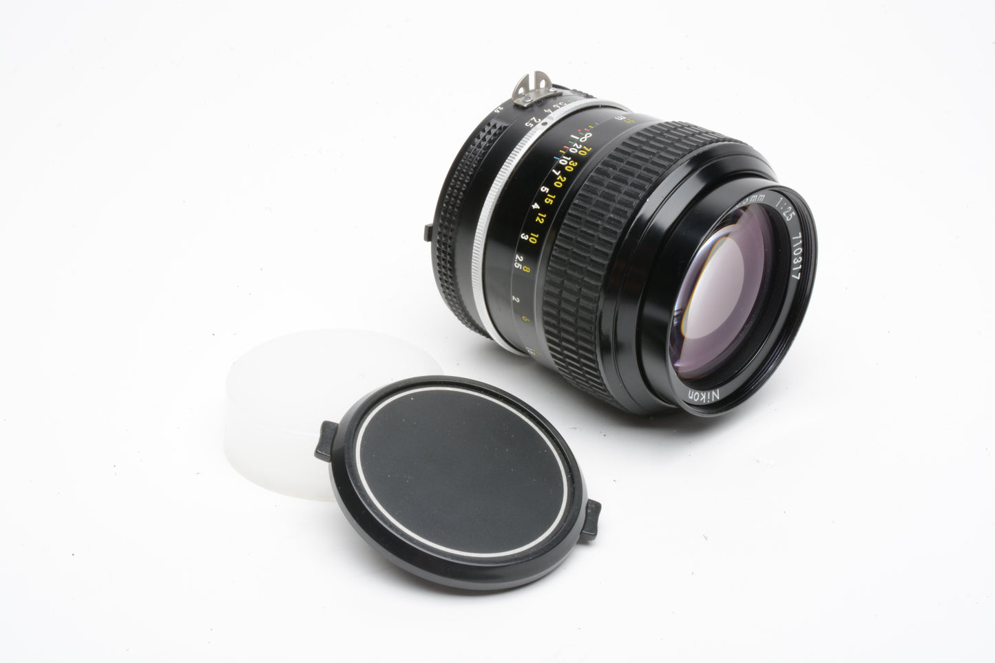 Nikon Nikkor AI 105mm f2.5 portrait lens, caps, very clean & sharp!