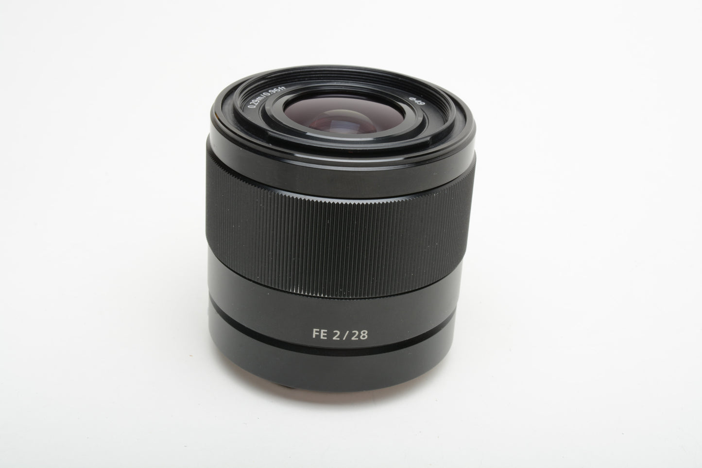 Sony FE 28mm f2 SEL28F20 wide angle lens, caps+hood, clean & sharp