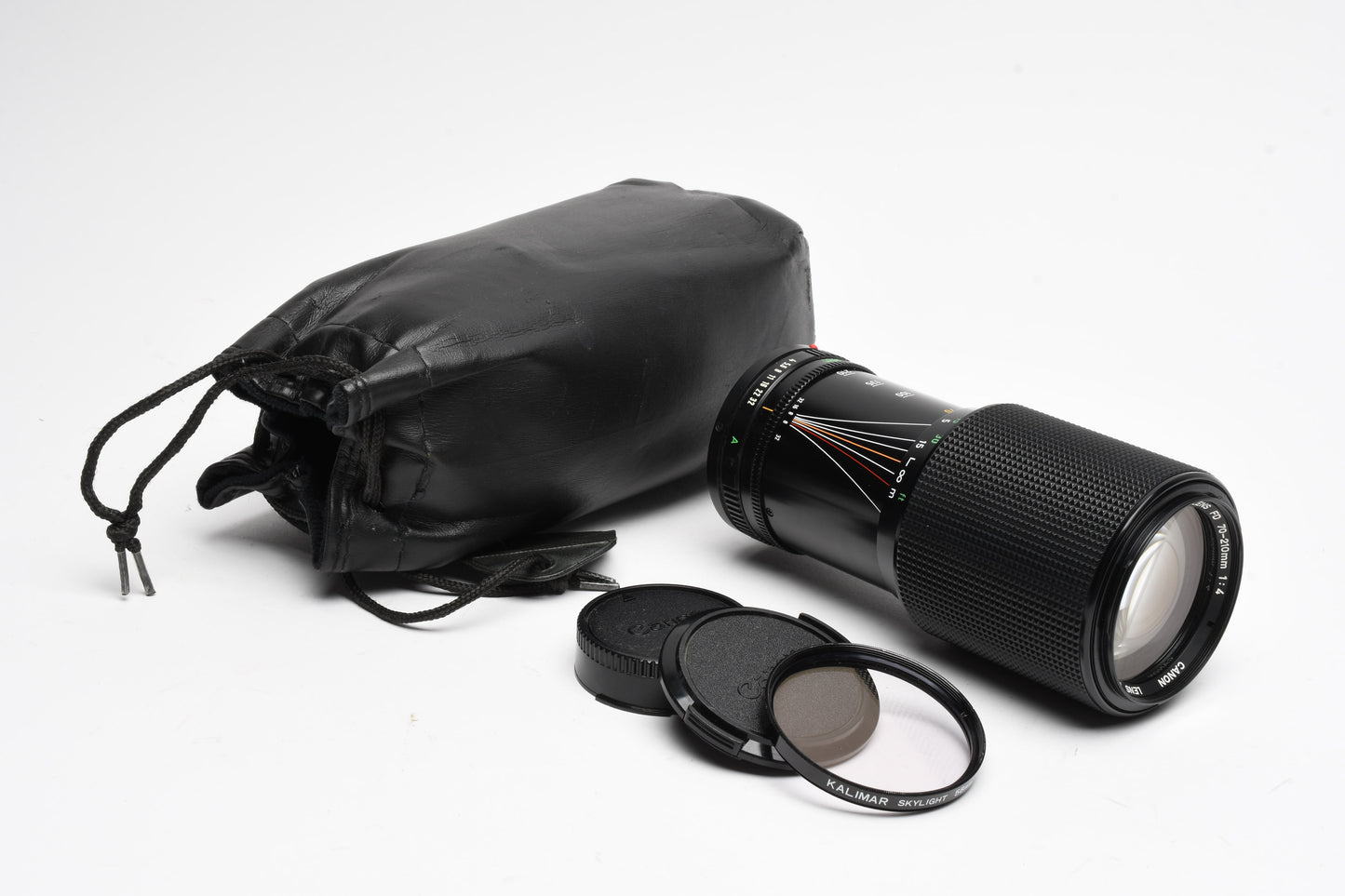 Canon FD 70-210mm f4 zoom lens, caps, pouch, sky filter, Nice