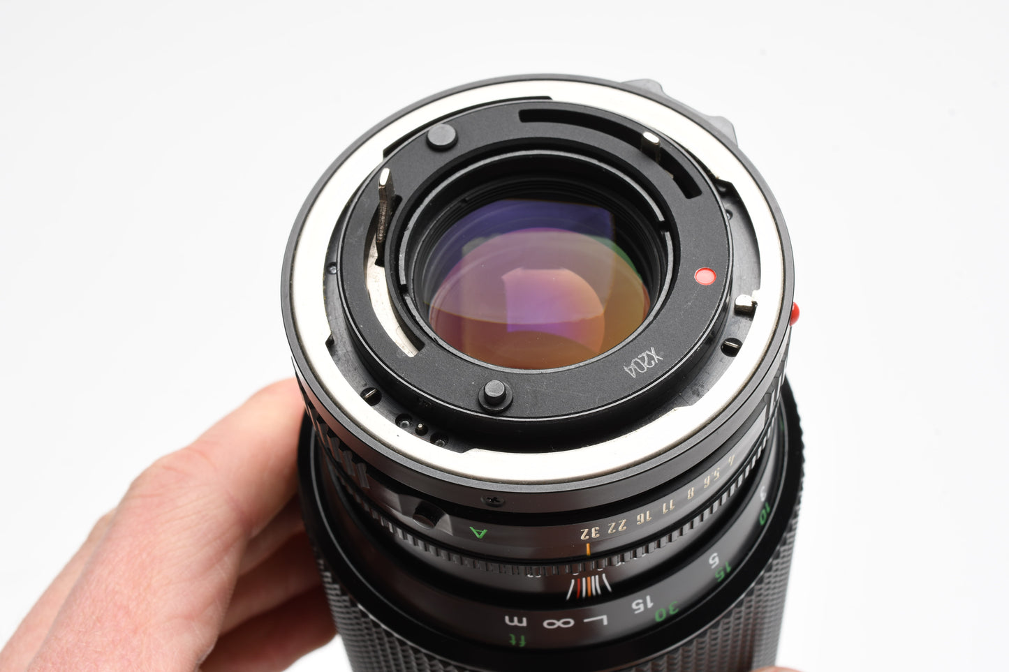 Canon FD 70-210mm f4 zoom lens, caps, pouch, sky filter, Nice