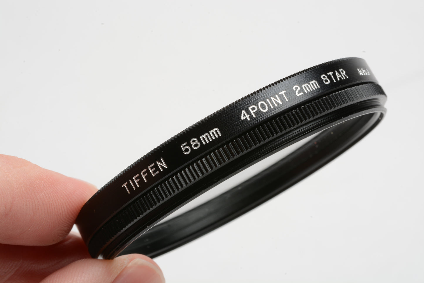 Tiffen 58mm 4-Point 2mm Star Effect filter, nice and clean