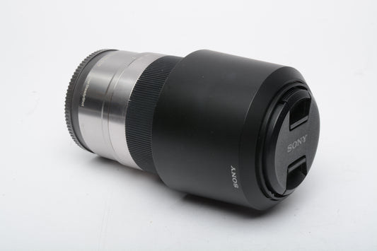 Sony 55-210mm f4.5-6.3 OSS zoom lens (Silver) w/Lens caps + Lens hood