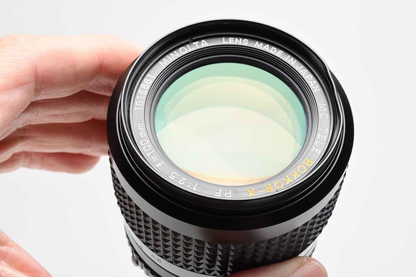 Minolta Rokkor-X 100mm f2.5 MD lens, Hood, Cap, Jewel case, Mint-