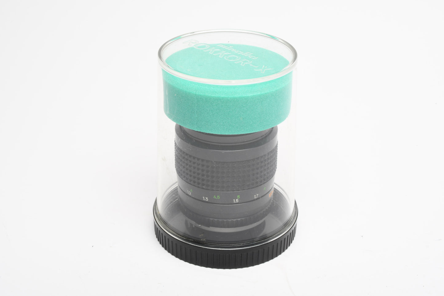 Minolta Rokkor-X 100mm f2.5 MD lens, Hood, Cap, Jewel case, Mint-