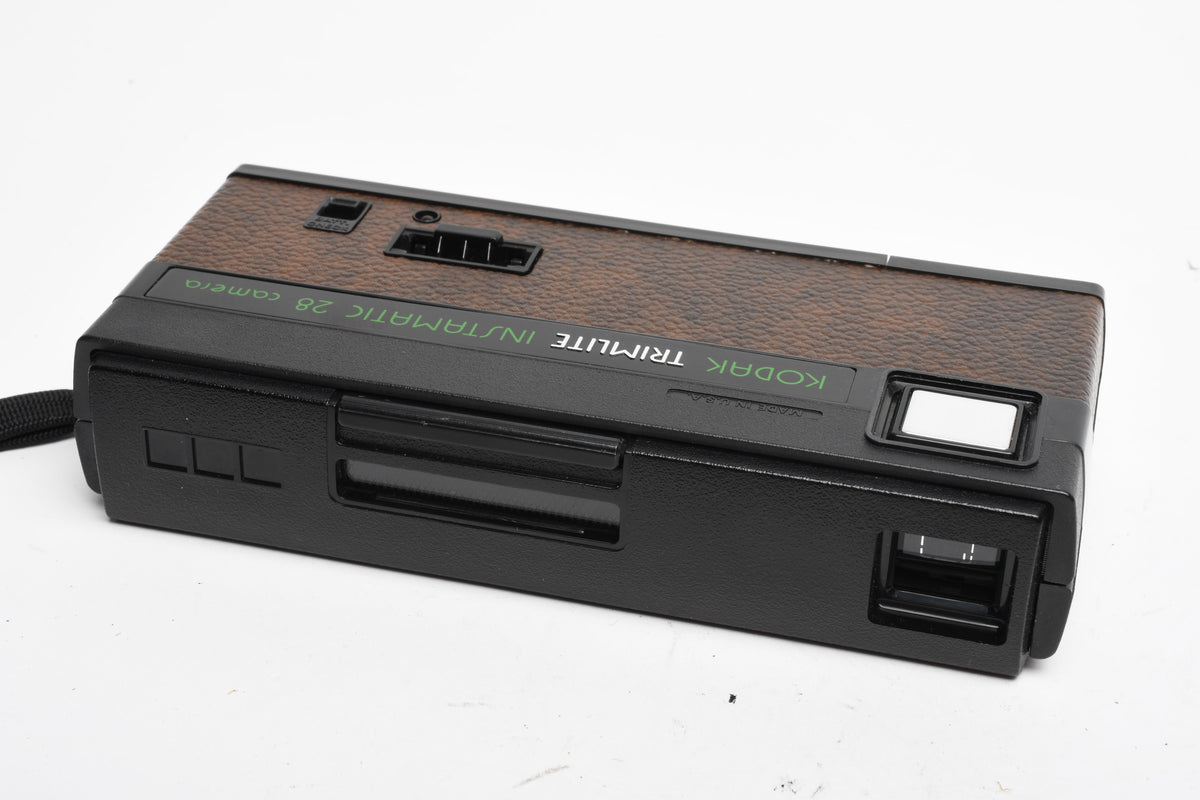 Kodak Trimlite 110 instamatic 28 camera, Strap+manual, Tested