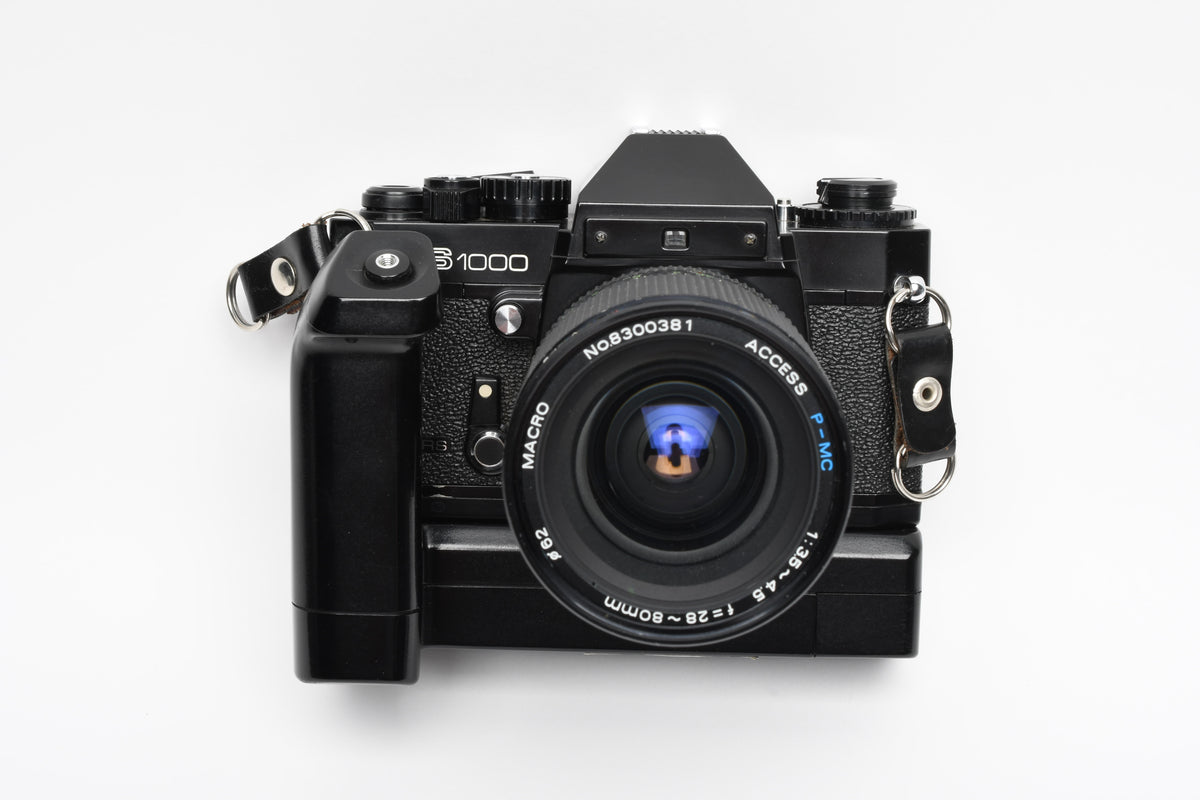 Sears KS1000 35mm SLR w/Access 28-80mm f3.5-4.5 zoom lens, winder strap, new seals