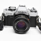 Minolta XG-M 35mm SLR w/50mm f1.7 lens, strap, cap, manuals, New seals, tested