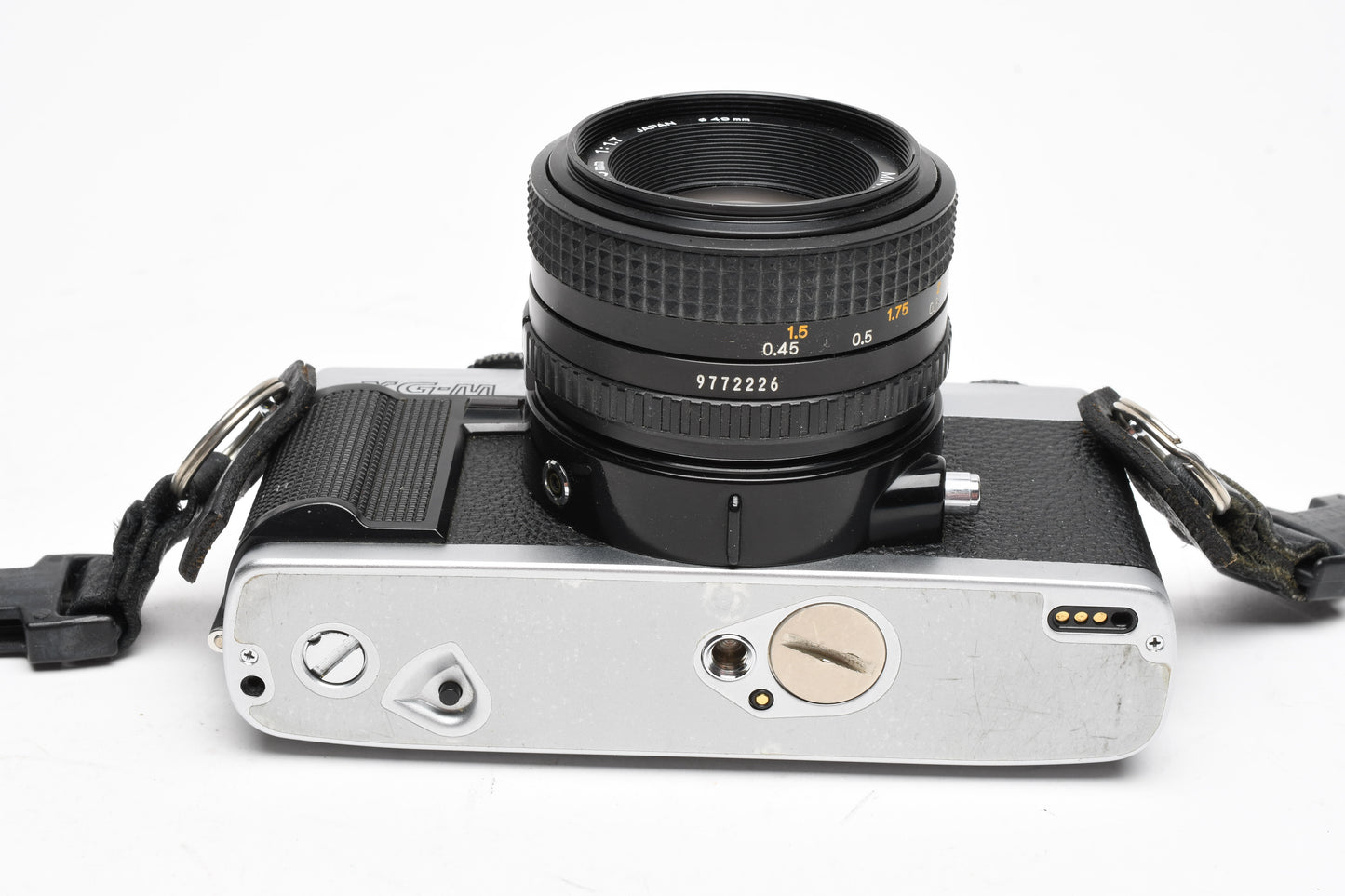 Minolta XG-M 35mm SLR w/50mm f1.7 lens, strap, cap, manuals, New seals, tested