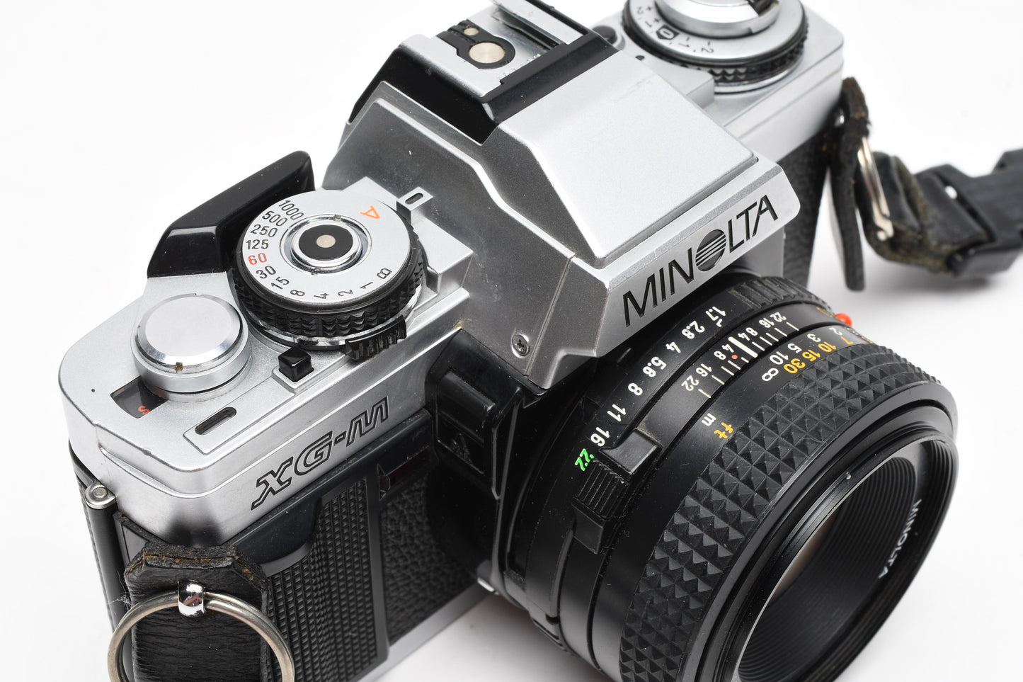 Minolta XG-M 35mm SLR w/50mm f1.7 lens, strap, cap, manuals, New seals, tested