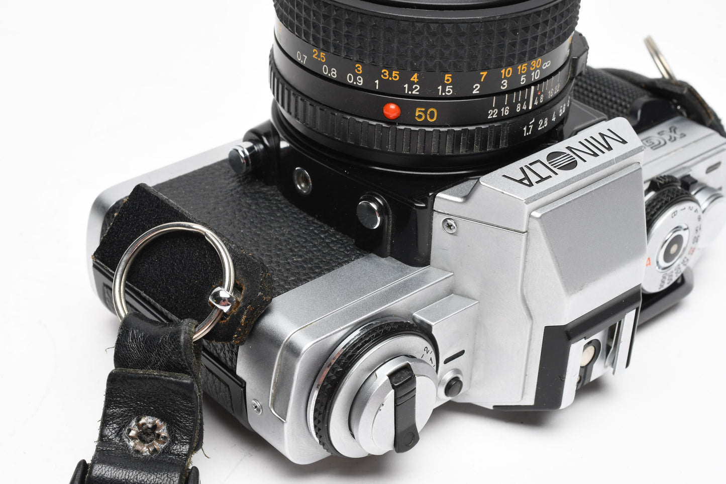 Minolta XG-M 35mm SLR w/50mm f1.7 lens, strap, cap, manuals, New seals, tested
