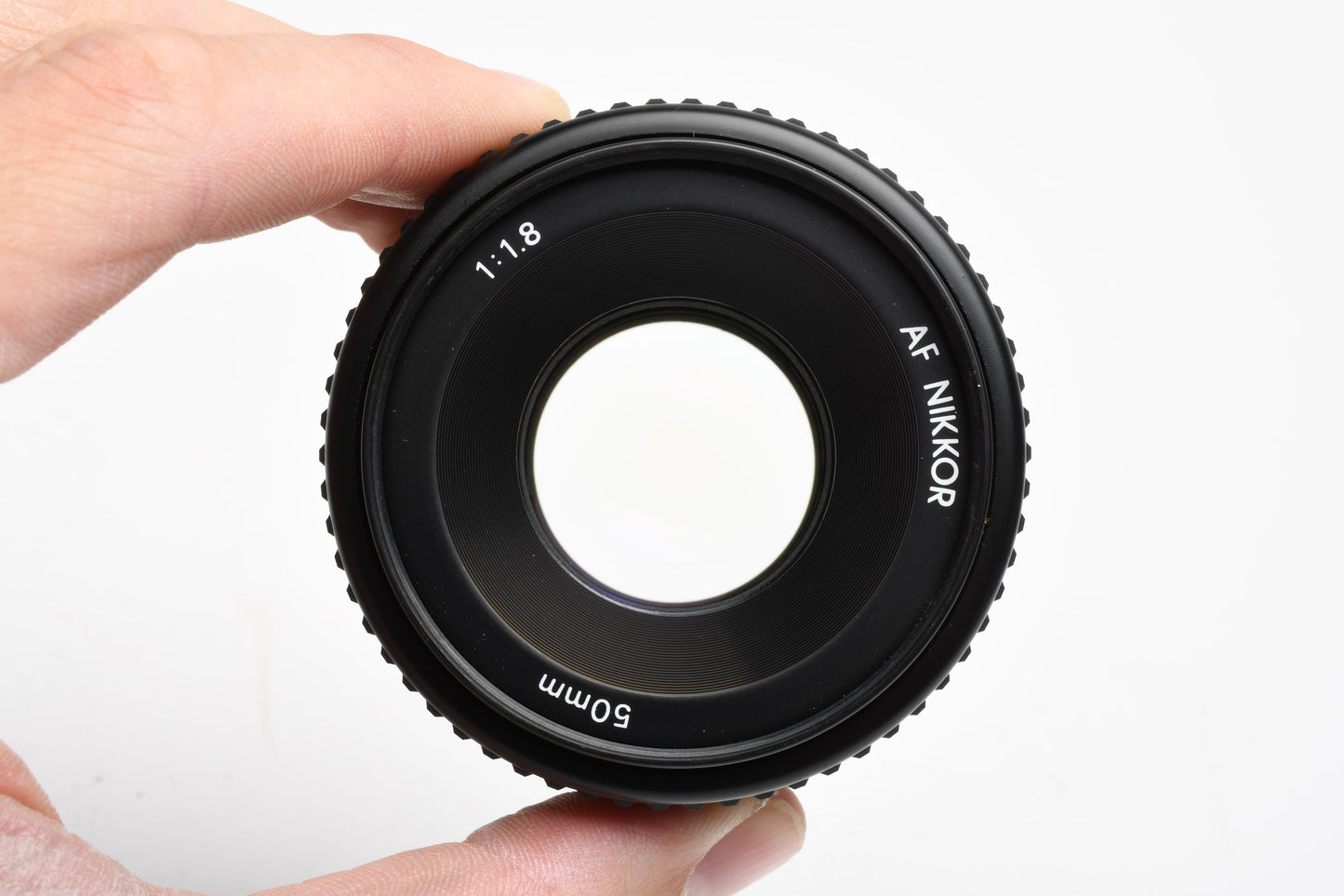 Nikon Nikkor AF 50mm f1.8 Prime lens, caps+UV filter
