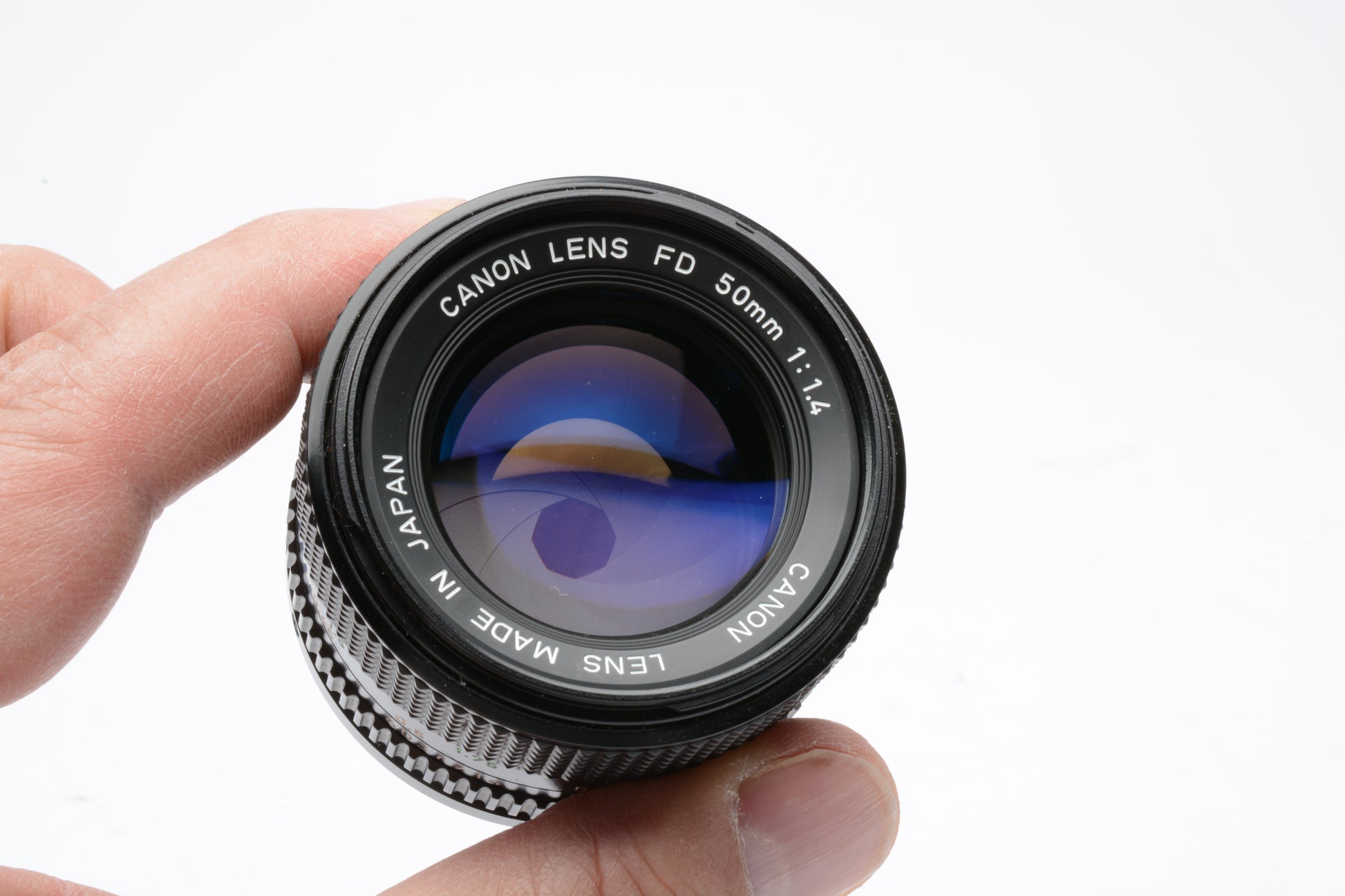 Canon new FD 50mm prime lens, caps, UV filter, clean and