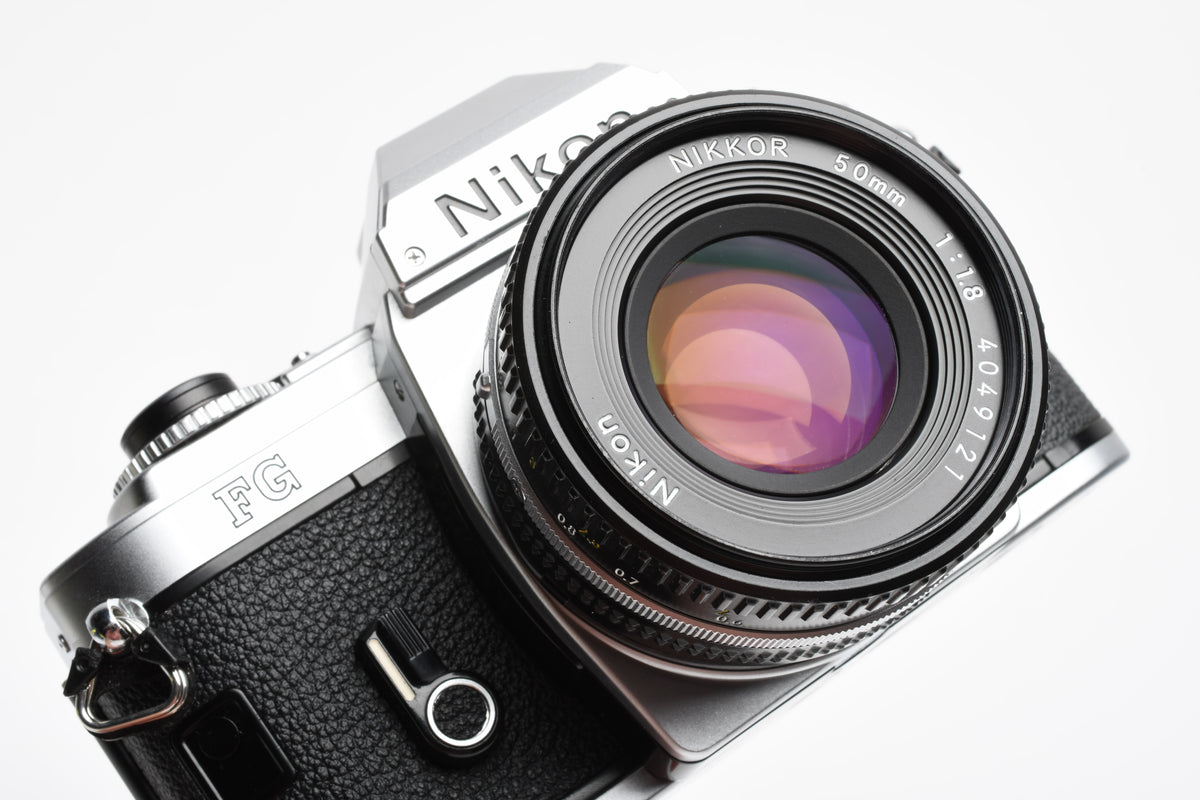 Nikon FG 35mm SLR w/Nikkor 50mm f1.8, New seals, Strap, Great!