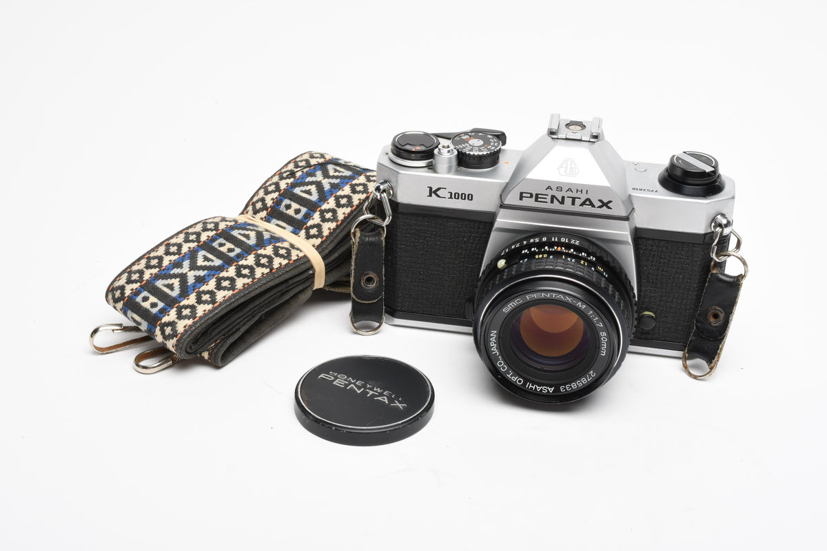 Pentax K1000 35mm SLR w/50mm f1.7 lens, New seals, strap, Great!