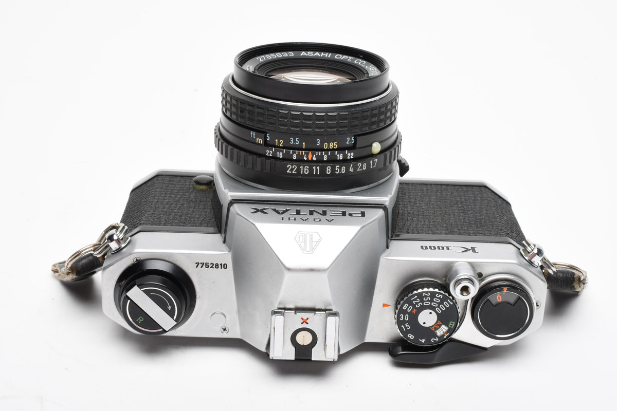 Pentax K1000 35mm SLR w/50mm f1.7 lens, New seals, strap, Great!