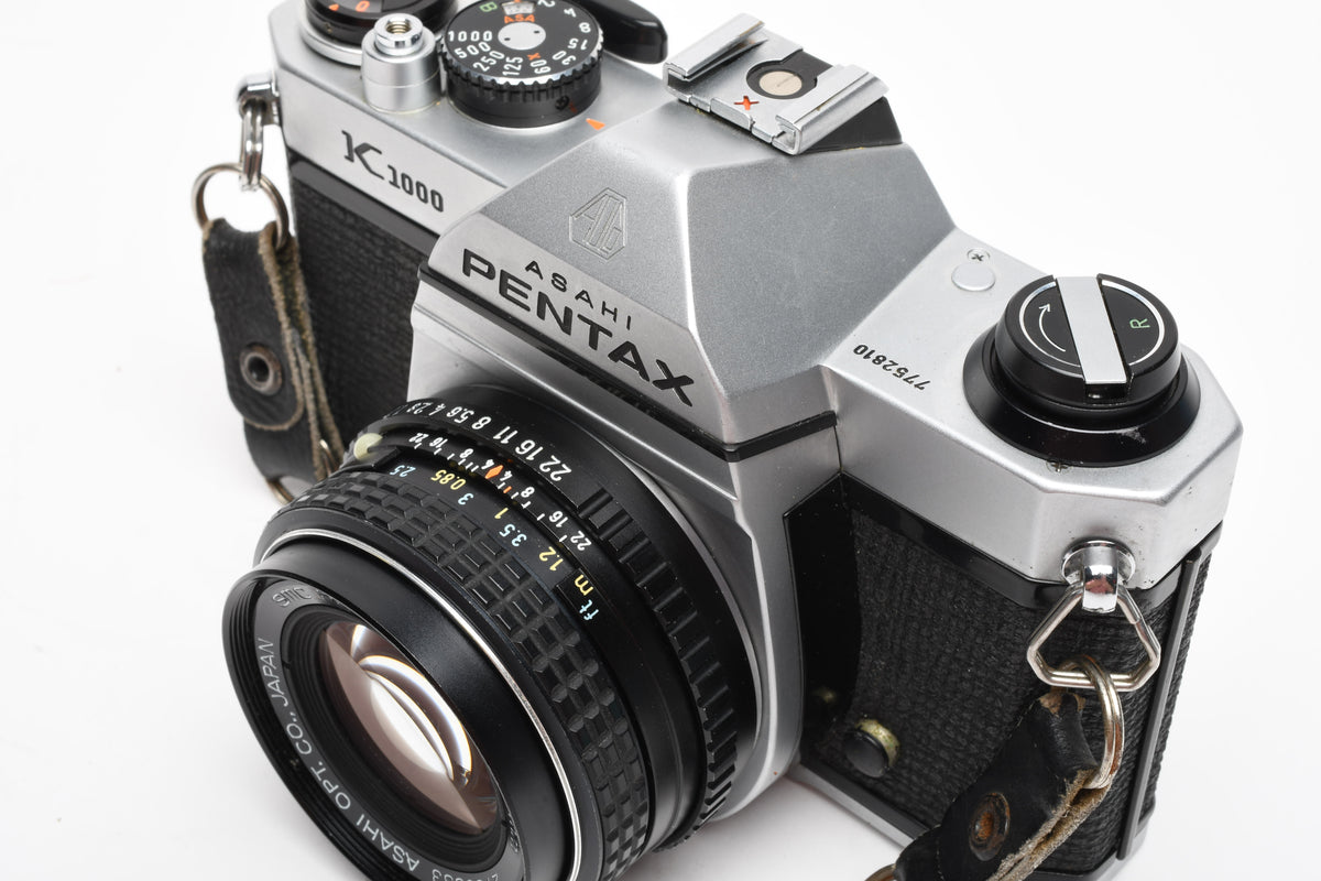 Pentax K1000 35mm SLR w/50mm f1.7 lens, New seals, strap, Great!