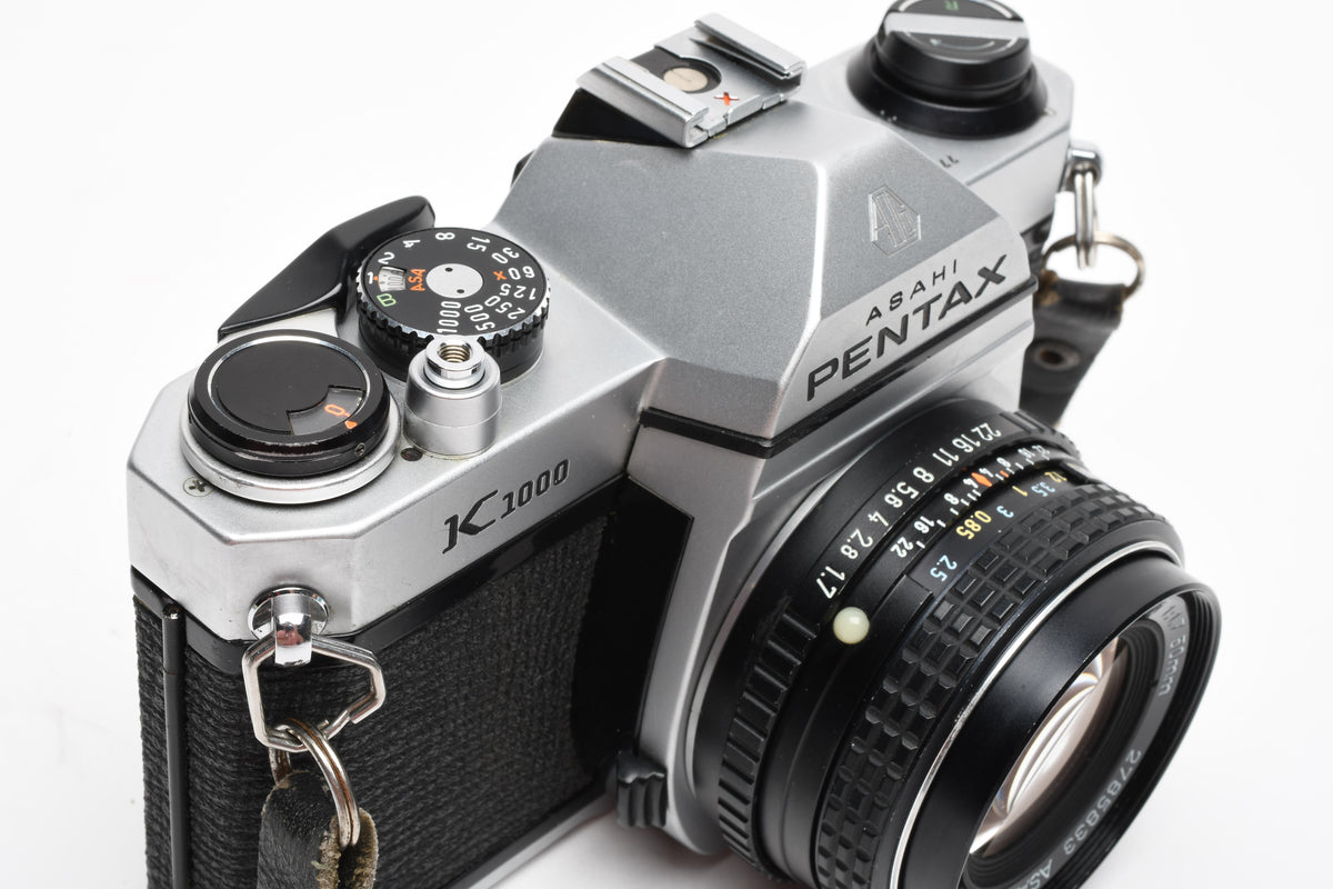 Pentax K1000 35mm SLR w/50mm f1.7 lens, New seals, strap, Great!