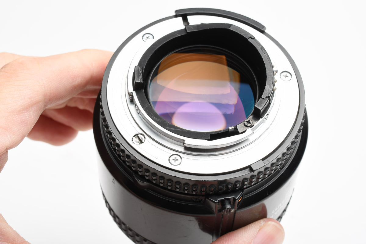 Nikon AF Nikkor 85mm F1.8 portrait lens, caps, UV, Sharp!