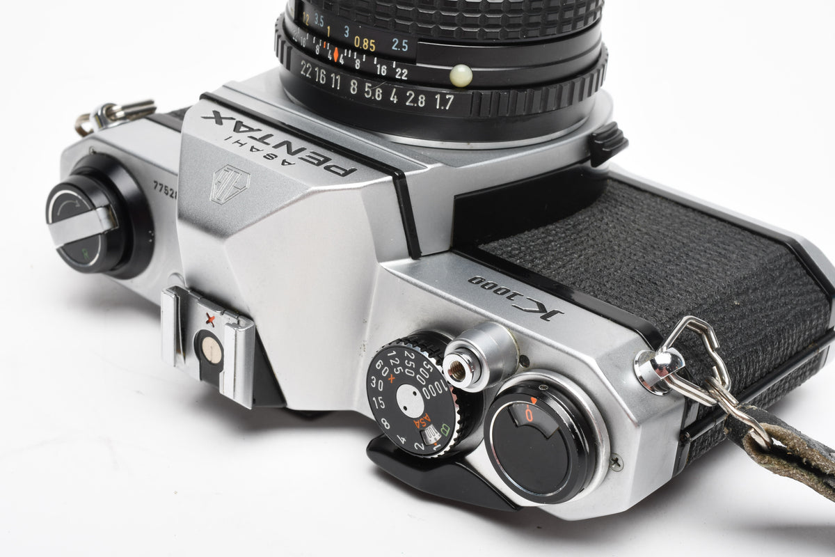 Pentax K1000 35mm SLR w/50mm f1.7 lens, New seals, strap, Great!