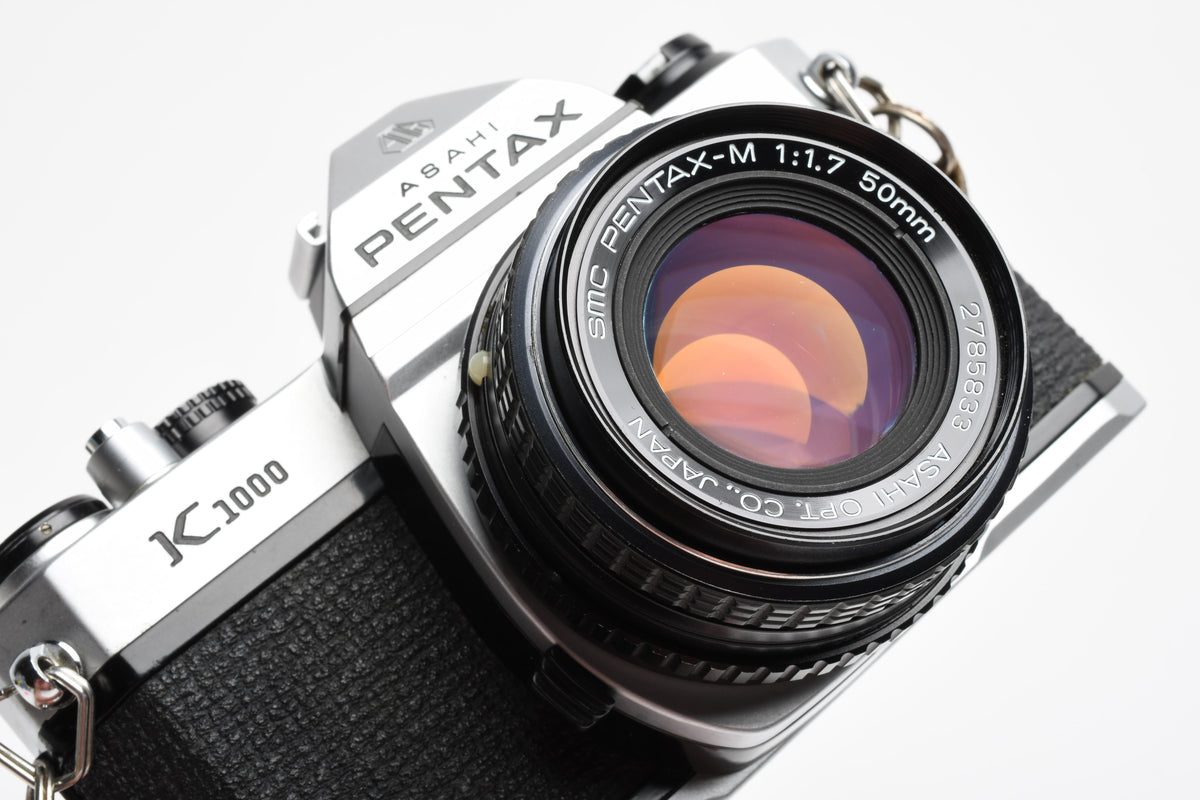 Pentax K1000 35mm SLR w/50mm f1.7 lens, New seals, strap, Great!