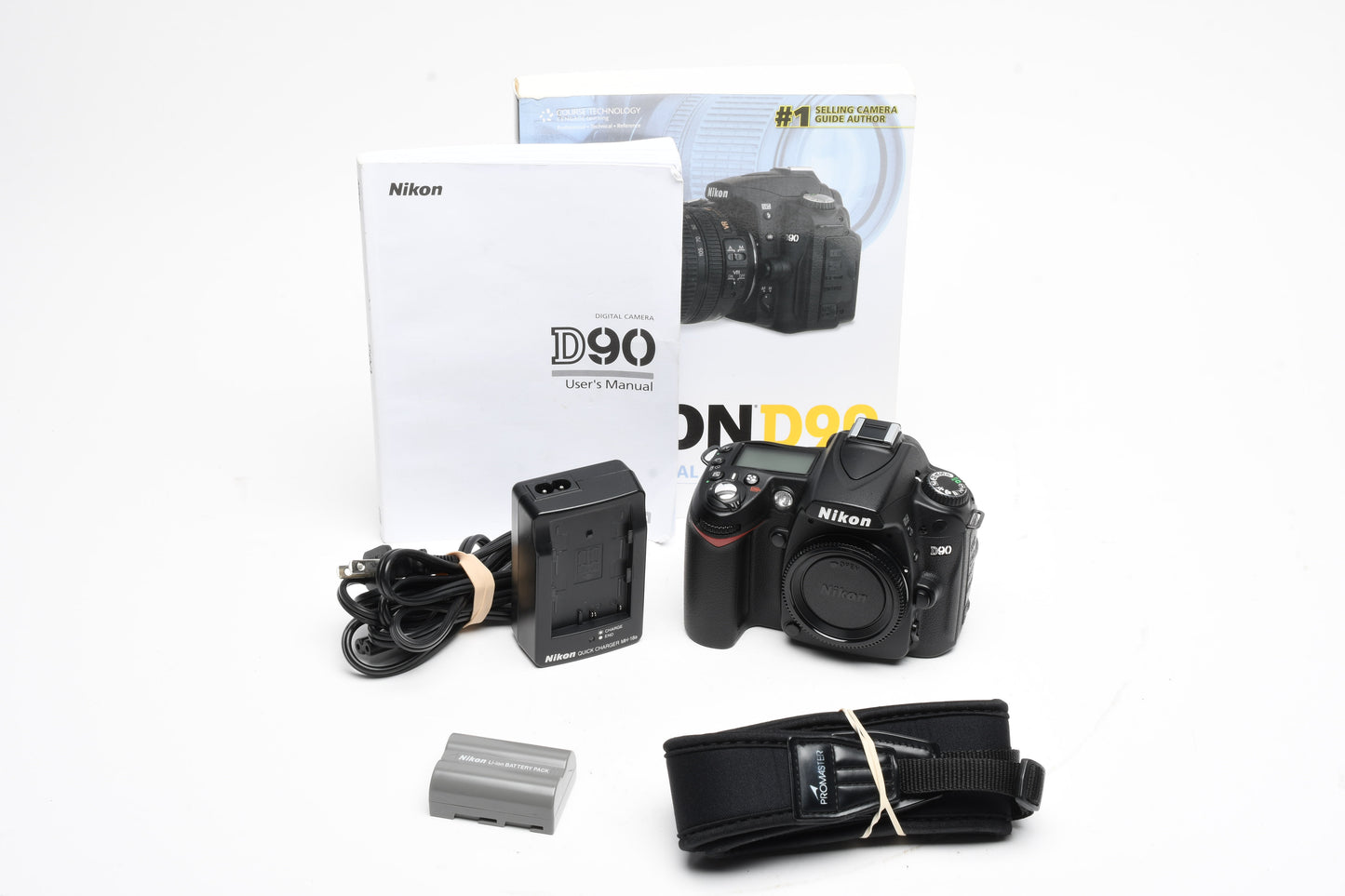 Nikon D90 DSLR body, batt, charger, strap, Only 6465 Acts, Great! +Book