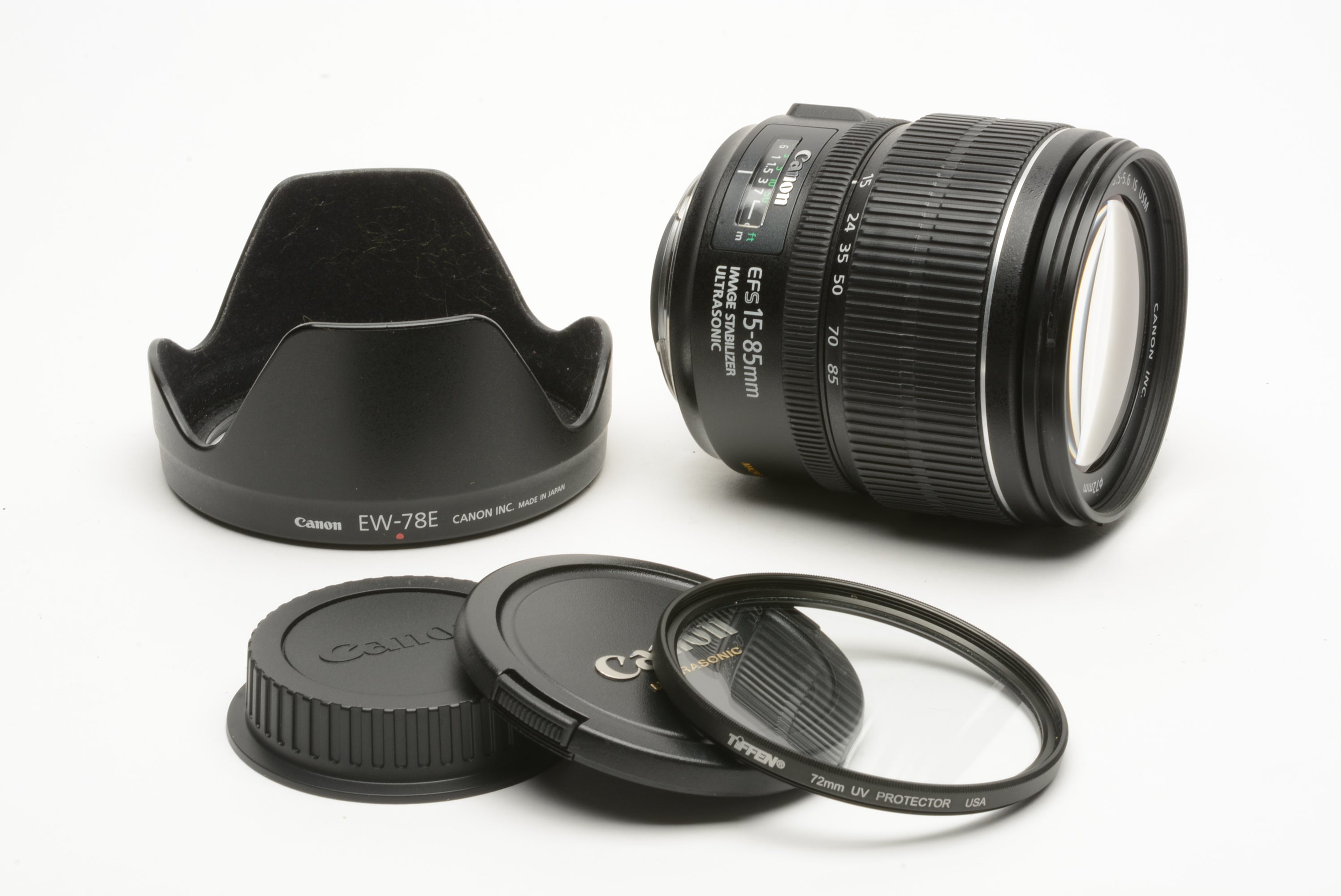 Canon EFS 15-85mm f3.5-5.6 IS USM zoom lens, hood+caps+UV