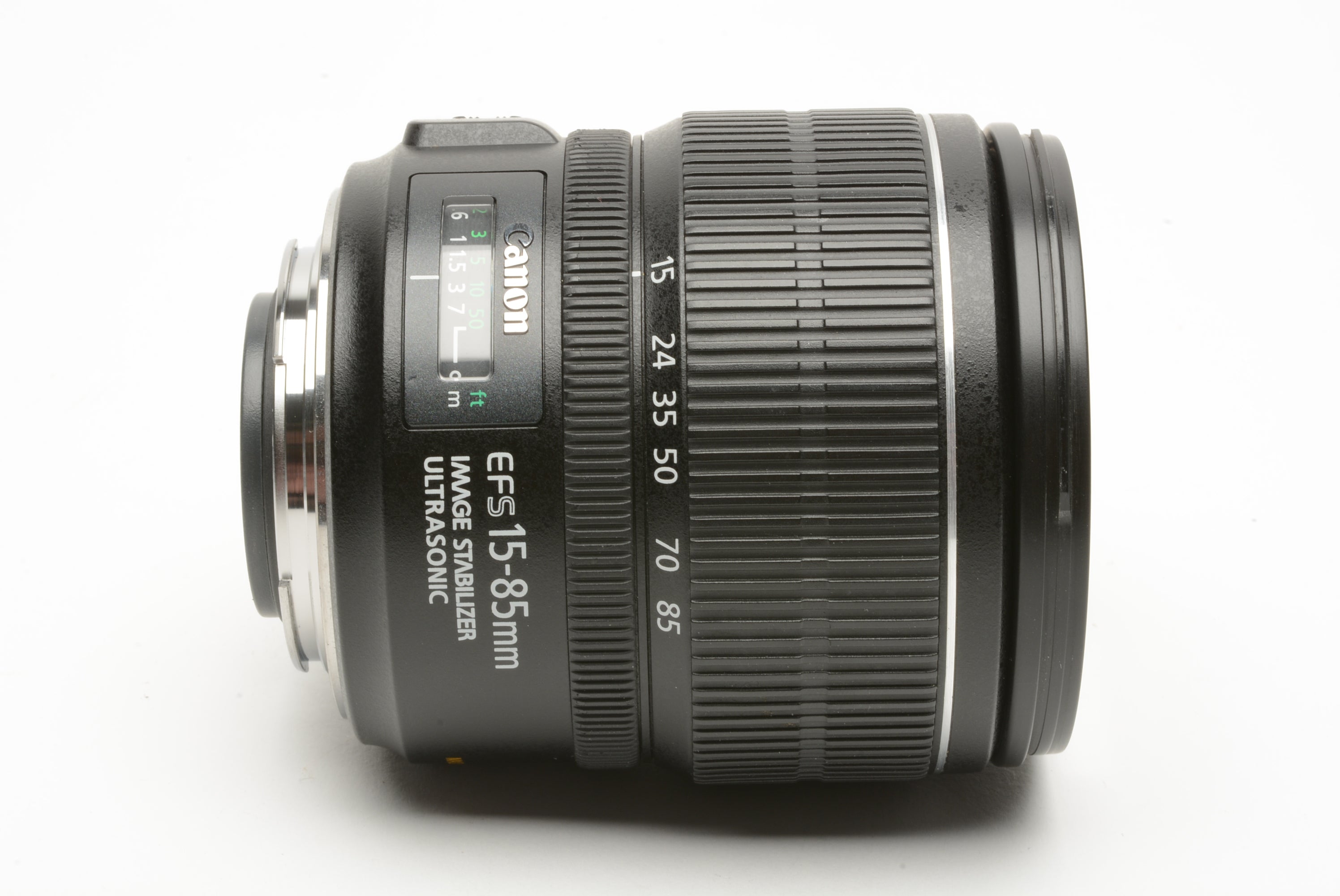 Canon EFS 15-85mm f3.5-5.6 IS USM zoom lens, hood+caps+UV