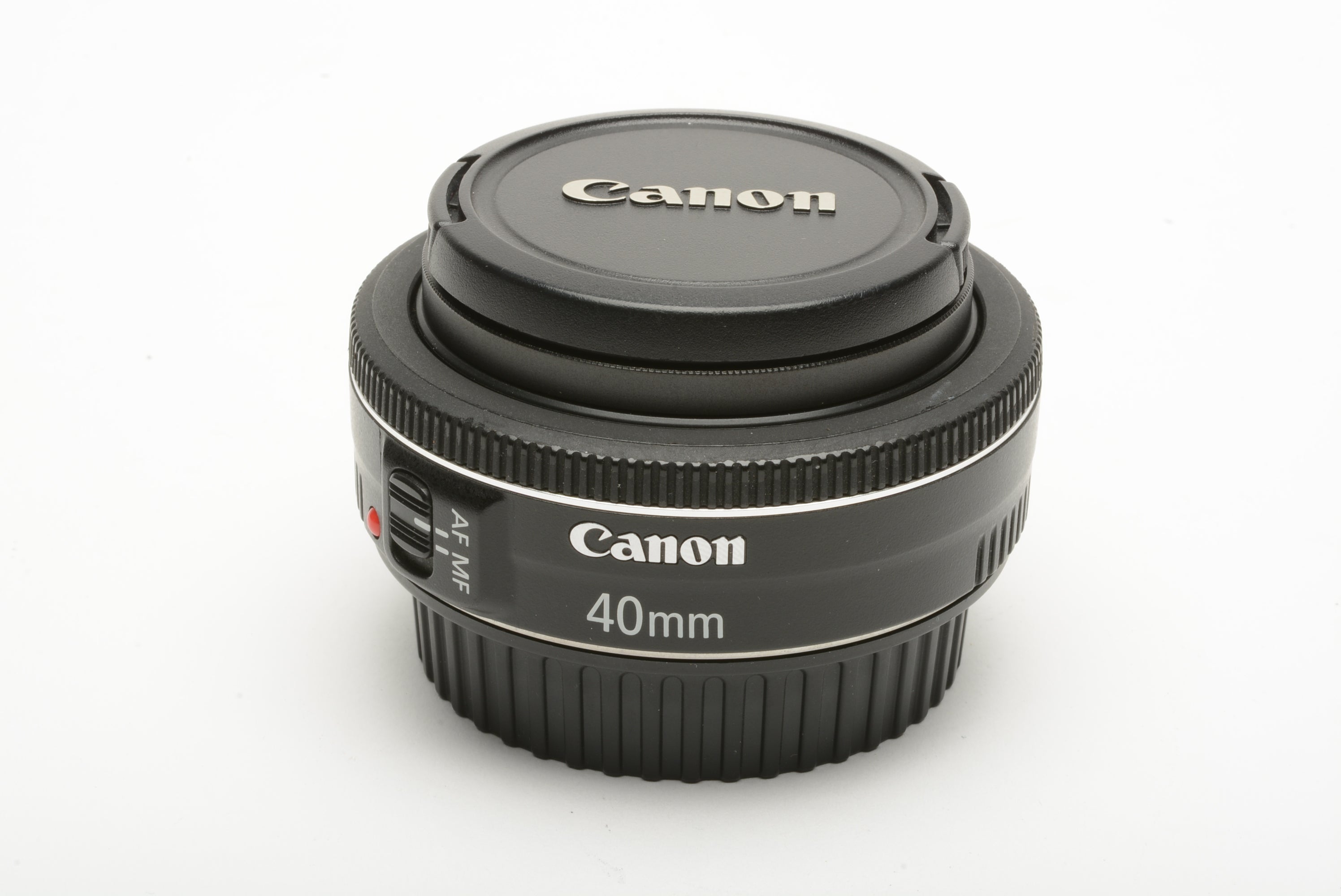 Canon 40mm f2.8 STM Macro pancake lens, caps, UV, tested, nice