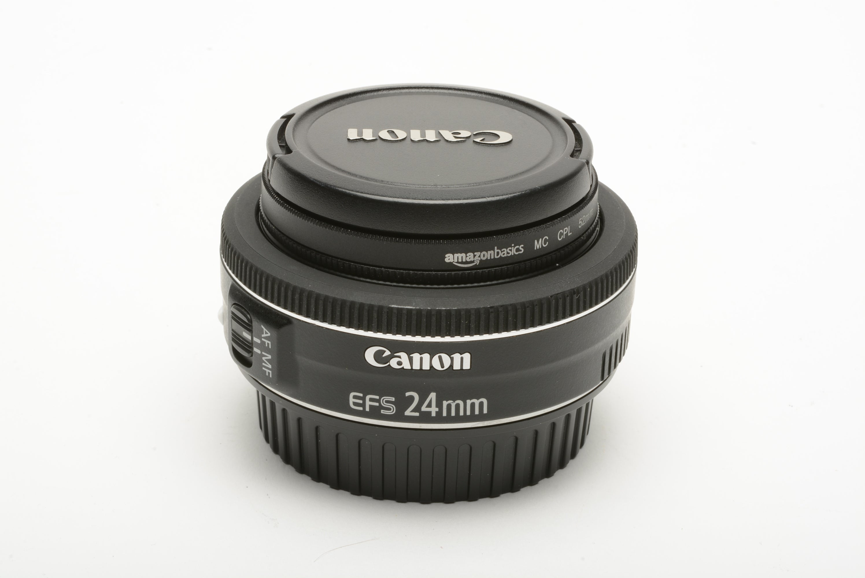 Canon 24mm f2.8 STM pancake lens, caps + Polarizing filter 