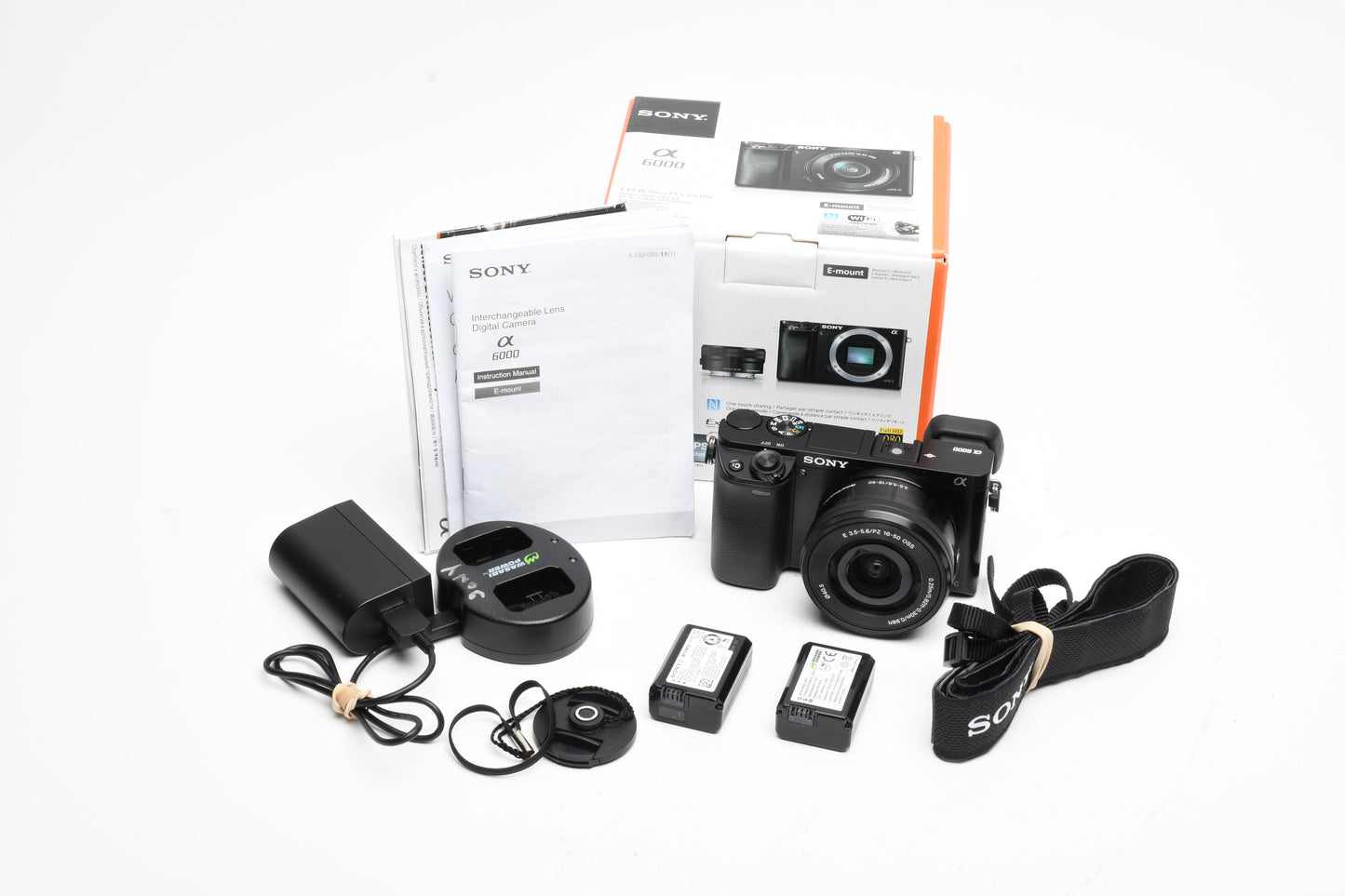 Sony A6000 Mirrorless w/16-50mm zoom, 2X batts, charger, Only 2718 Acts, Boxed