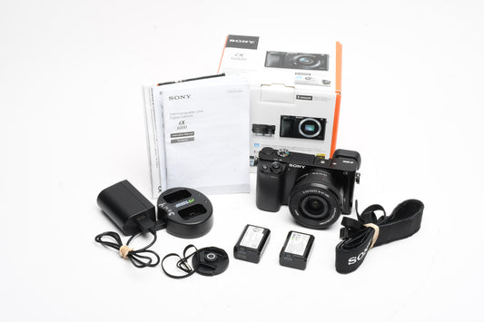 Sony A6000 Mirrorless w/16-50mm zoom, 2X batts, charger, Only 2718 Acts, Boxed