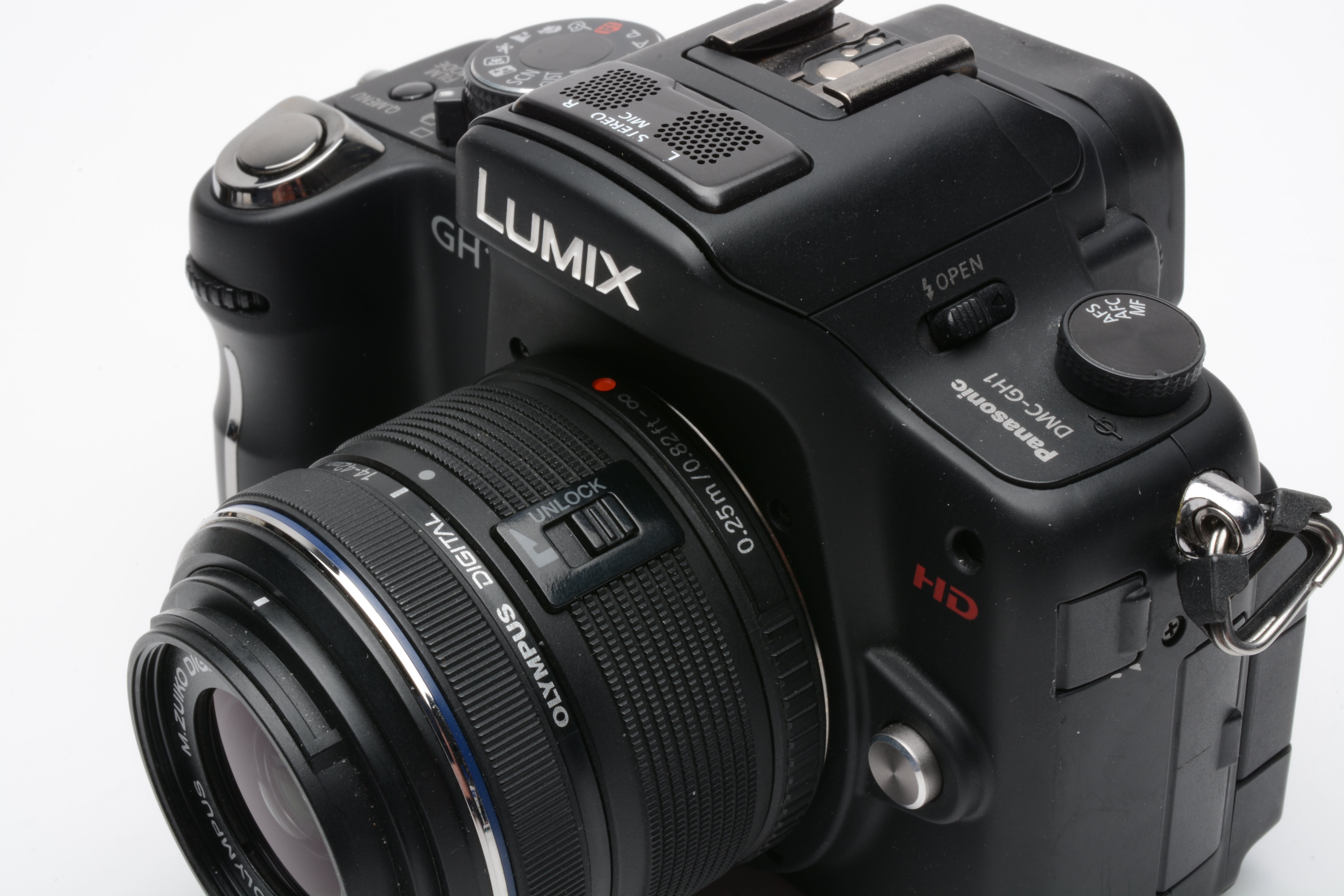 Panasonic Lumix DMC-GH1 w/Olympus 14-42mm f3.5-5.6 IIR MRC, 2batts