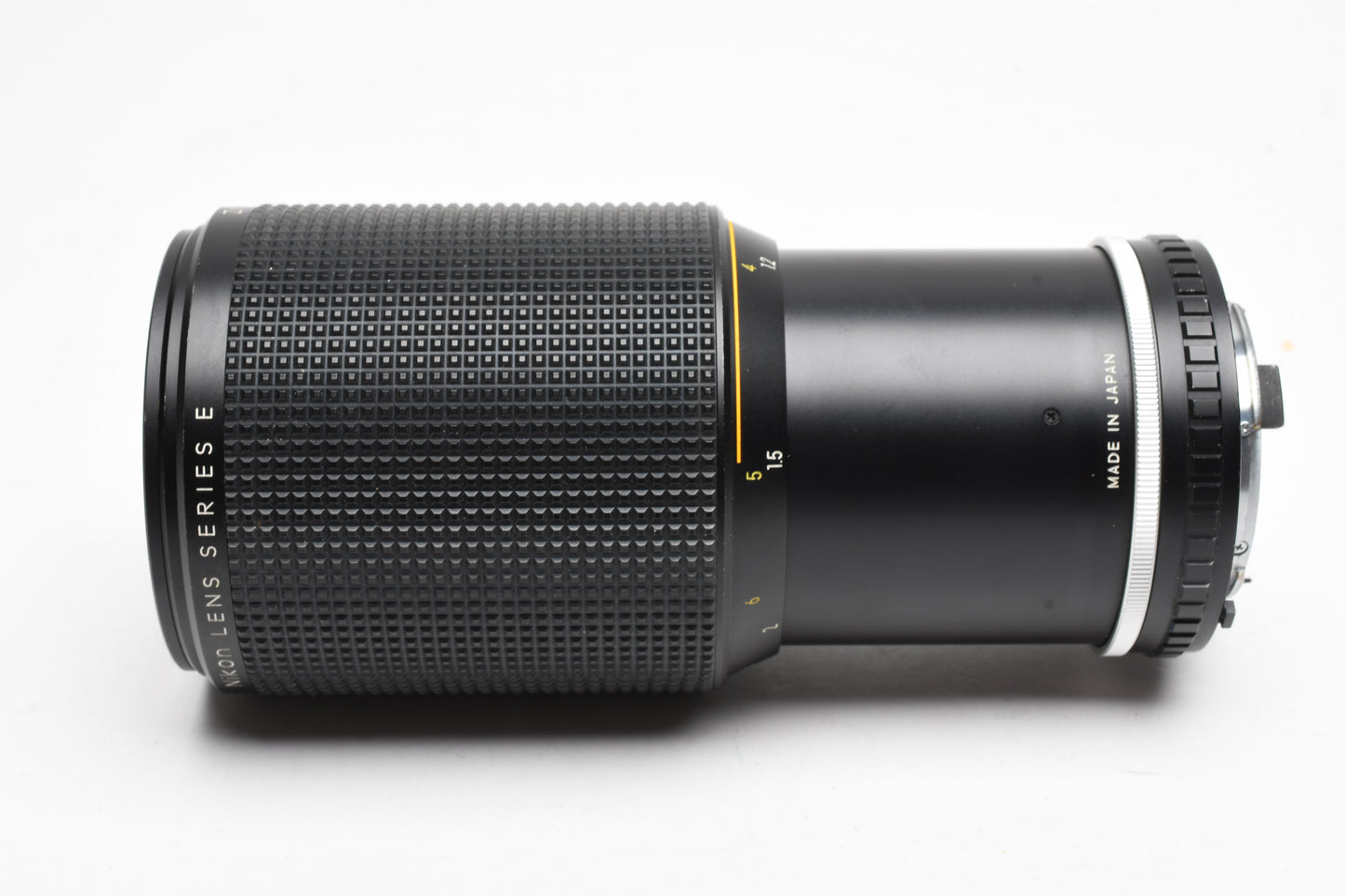 Nikon MF 70-210mm Series E f4 lens, caps, UV, Haze, still good