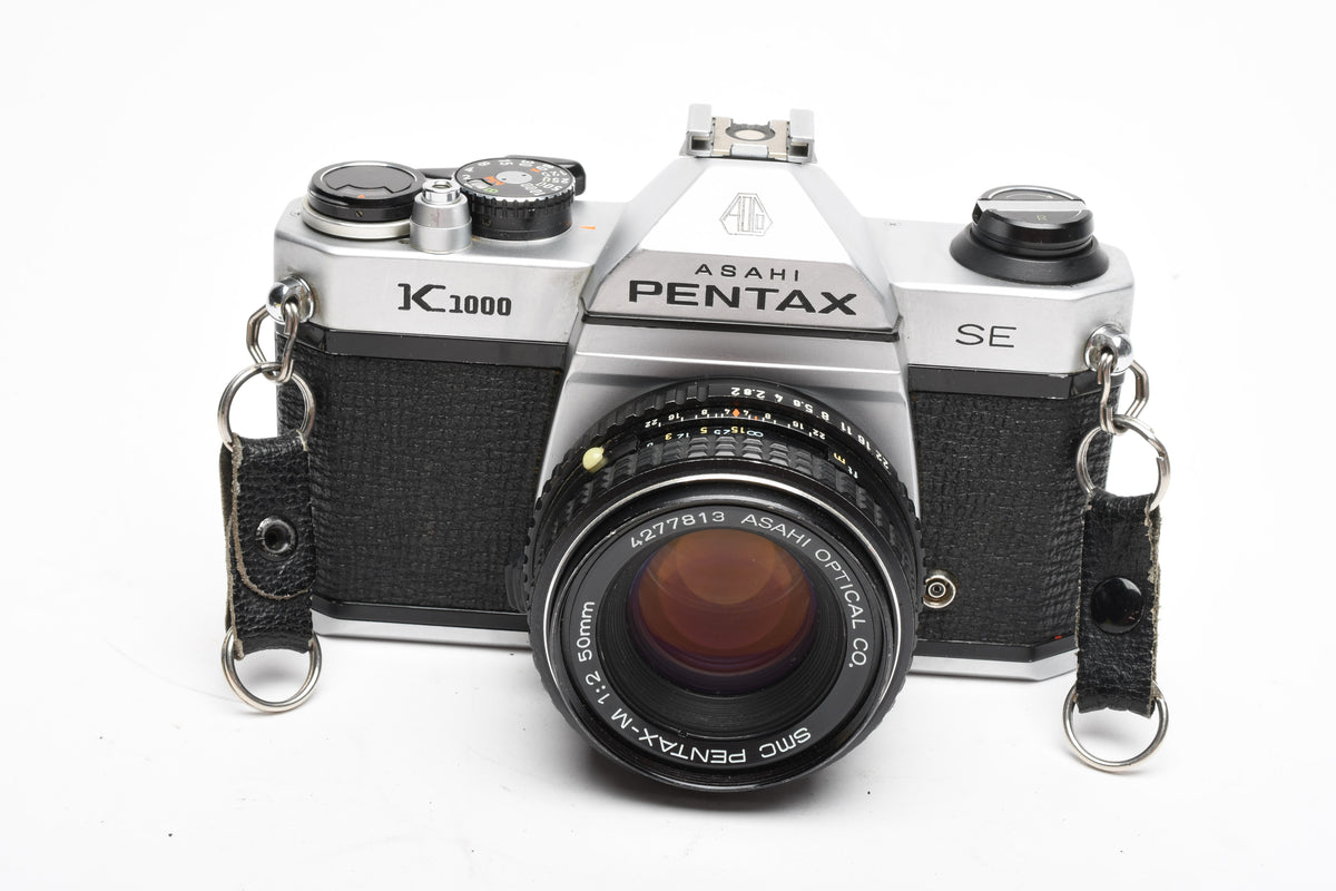 Pentax K1000 SE 35mm SLR w/50mm f2 lens, New seals, strap, case, Great!